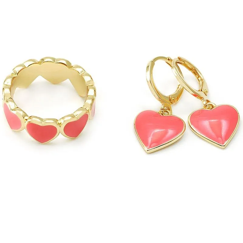Набір ювелірних виробів у формі сердечка з коралової емалі