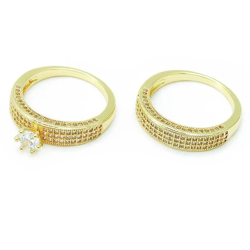 Унікальний позолочений набір весільних каблучок